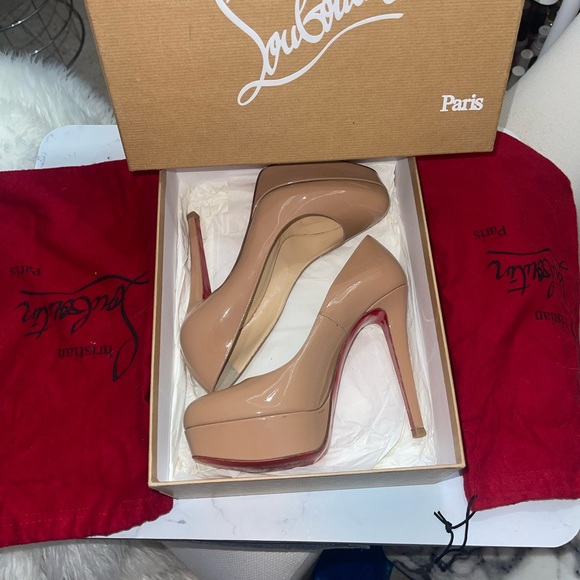Tan Louis Vuitton Pumps with original box, an original underneath red bag